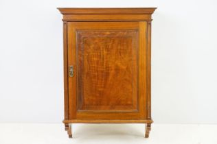 20th century mahogany hanging wall cabinet, with panelled door above carved bracket base, the