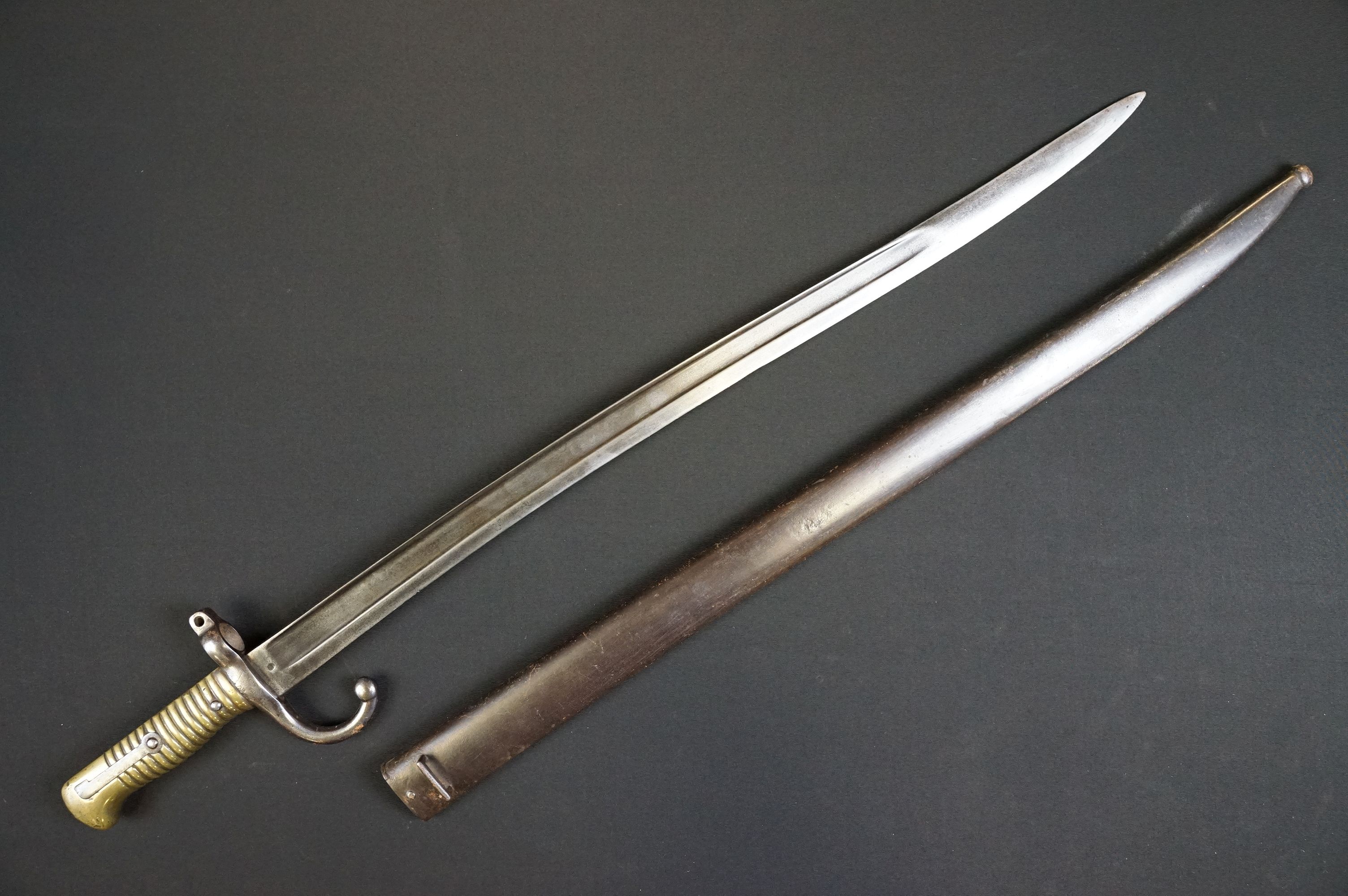 A French M1866 Chassepot Bayonet together with scabbard.