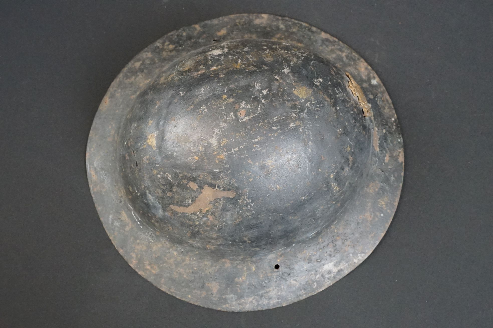 A British World War One Brodie helmet badged to the Royal Gloucestershire Fusiliers. - Image 4 of 6