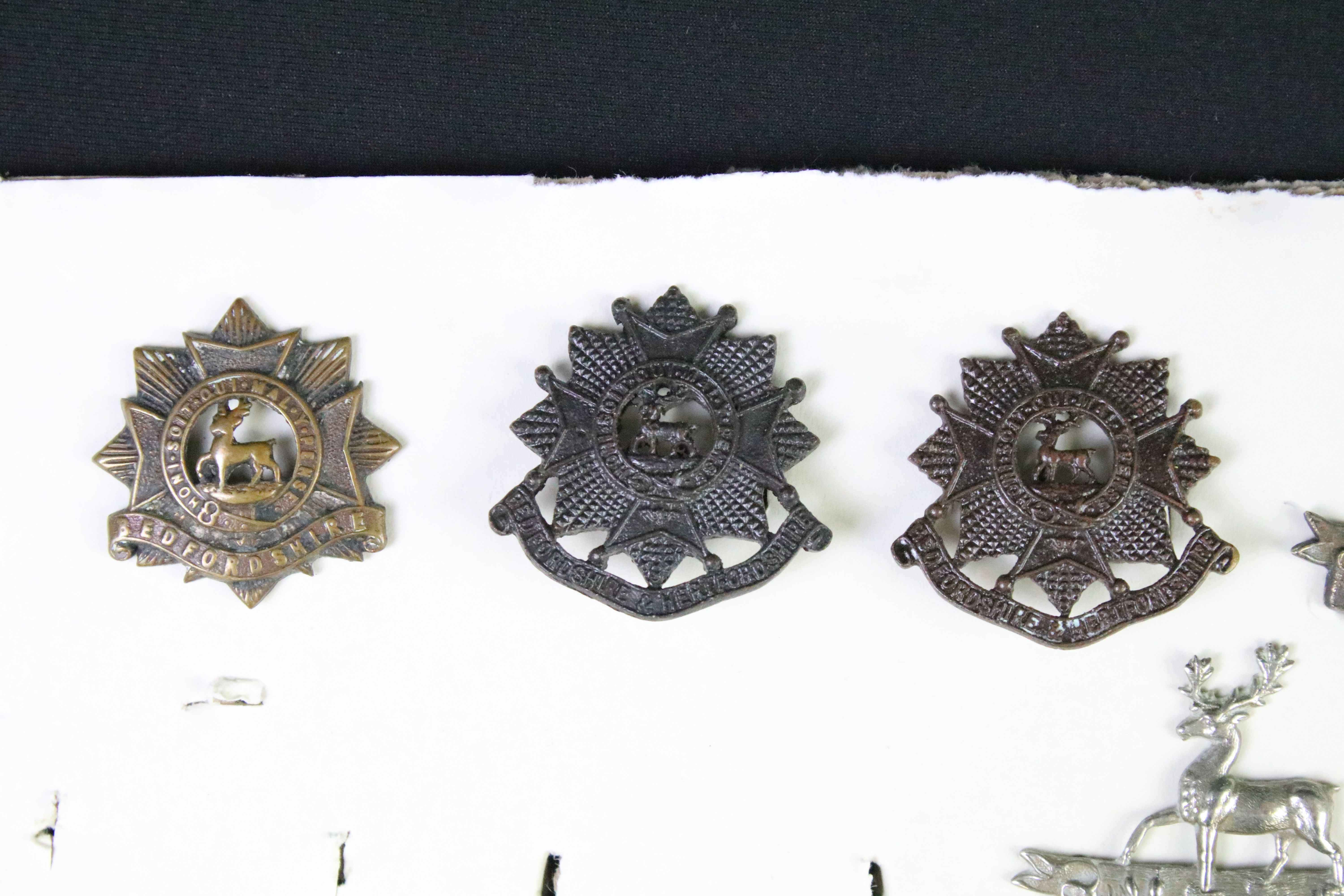 A collection of mainly British military cap and collar badges to include officers examples. - Image 2 of 18