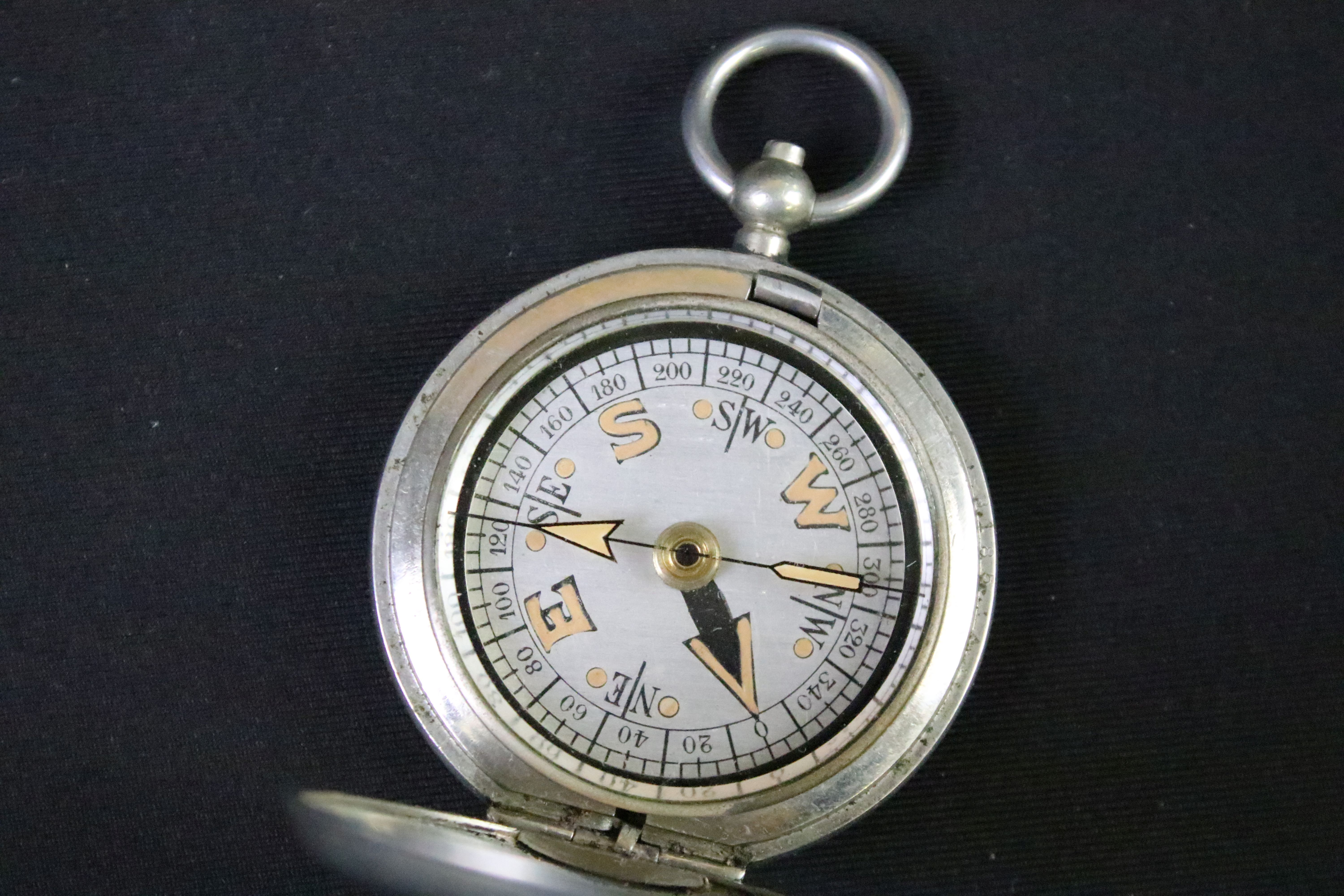 A British military issued World War One pocket marching compass, the case marked Dennison, - Image 2 of 5