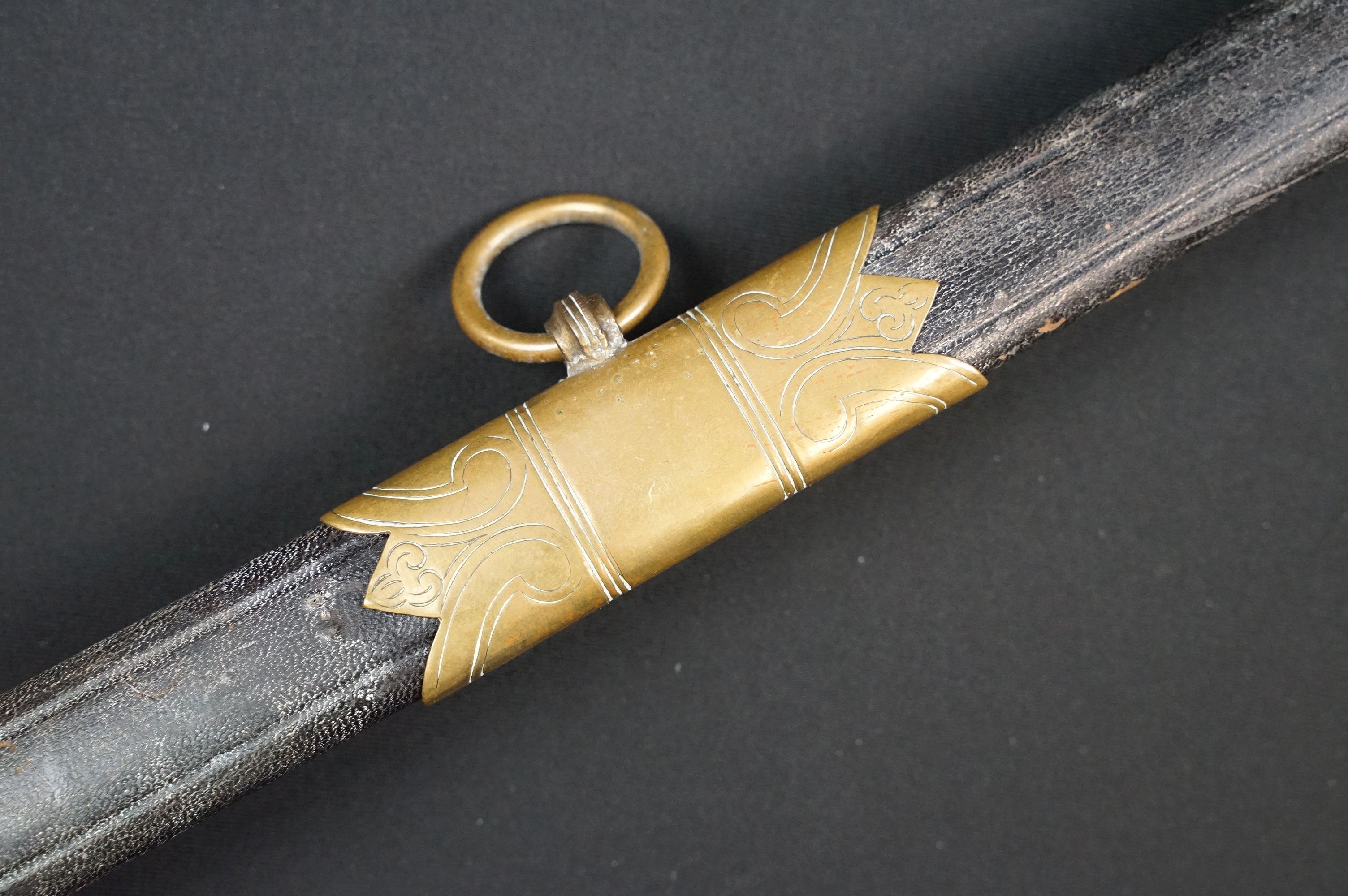 A German Imperial officers Navy dress sword complete with leather scabbard, the hilt is cast with - Image 15 of 16