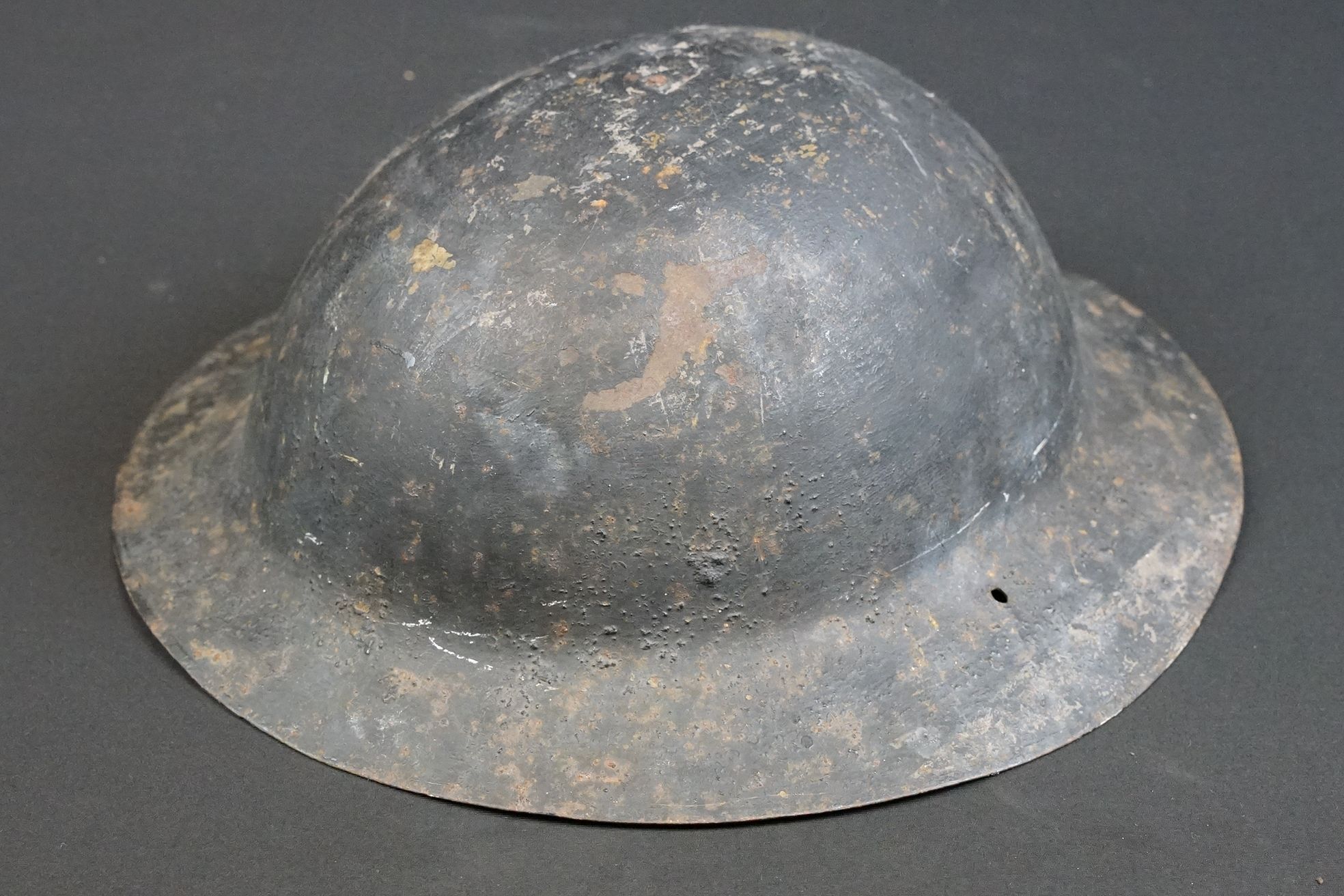 A British World War One Brodie helmet badged to the Royal Gloucestershire Fusiliers. - Image 3 of 6