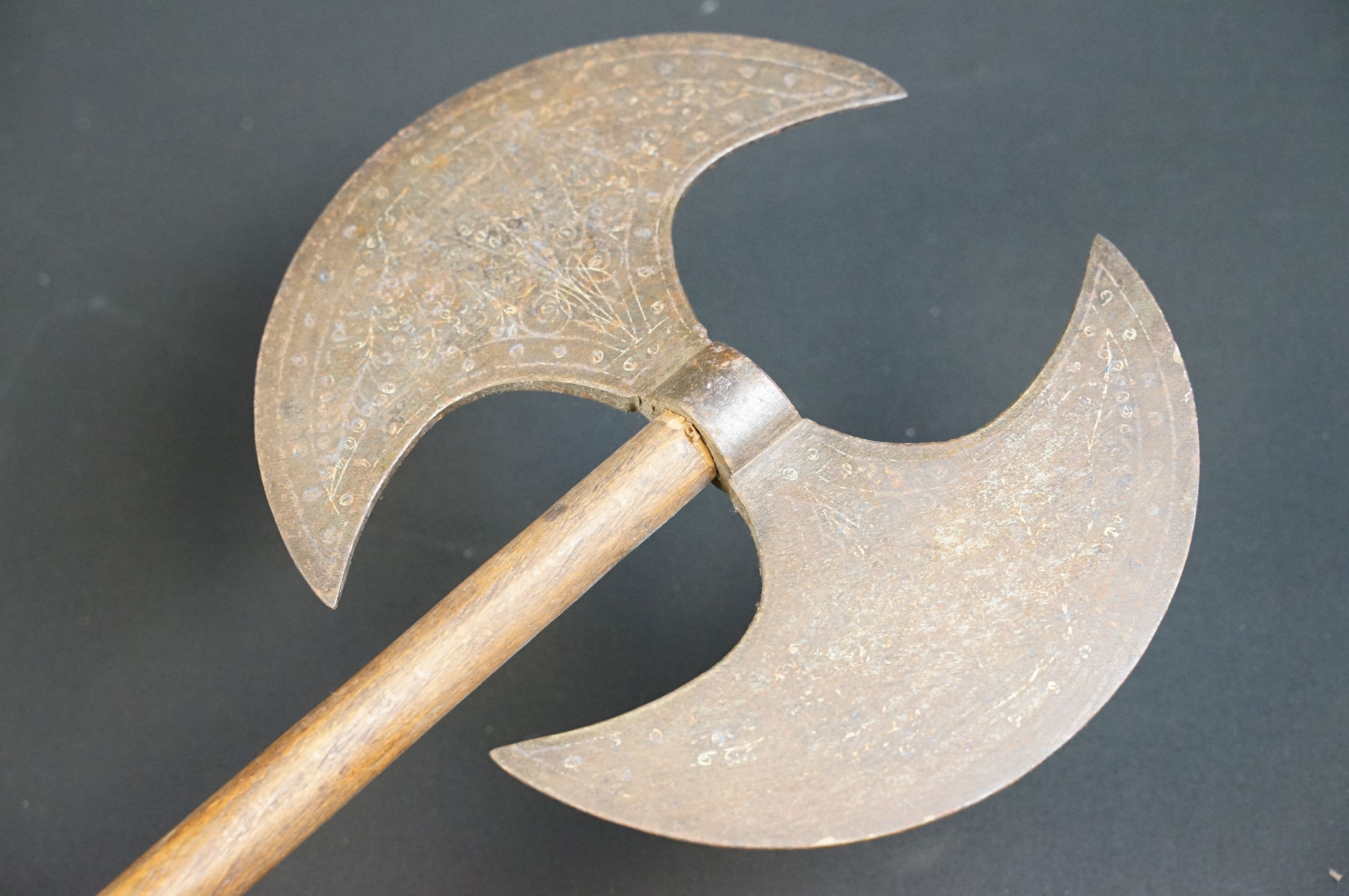 A Persian double headed axe with decorative pattern to the axe head, spike to lower wooden handle. - Image 2 of 6