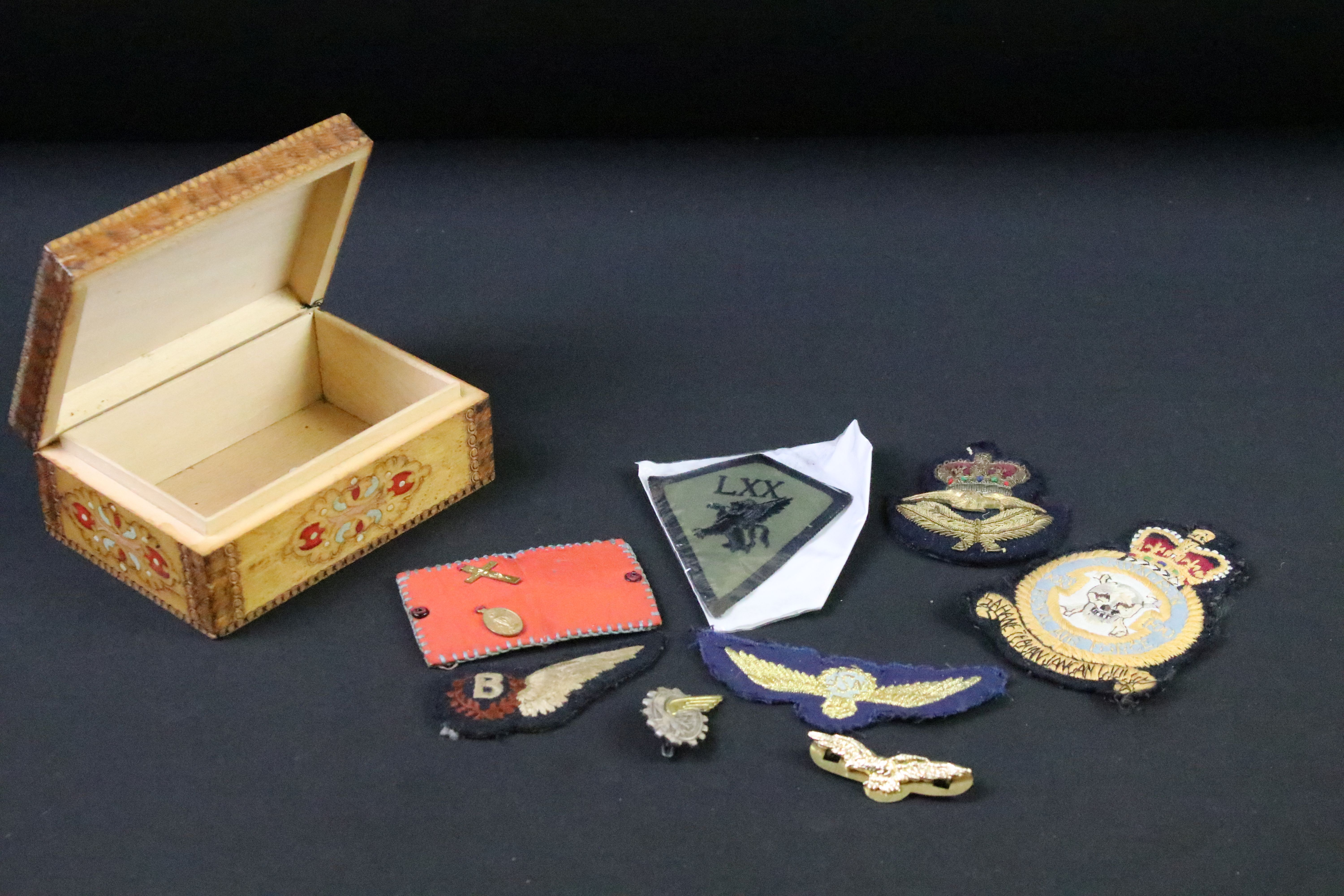 A collection of mainly British Royal Air Force cloth badges to include a bomber brevet.
