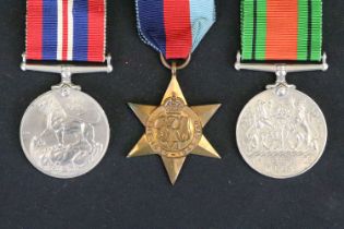 A British Full Size World War Two Medal Trio To Include The 1939-1945 British War Medal, The Defence