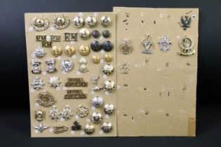 A collection of mainly Staybrite British military buttons and badges to include The Royal Marines,