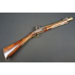 A FLINTLOCK COACHING BLUNDERBUSS by Mewis & Co, with 14 1/2" brass bell ended barrel, Birmingham