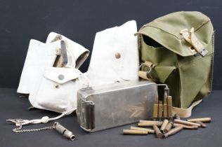 A box of mixed military collectables to include webbing belt with pistol holster, respirator bag and