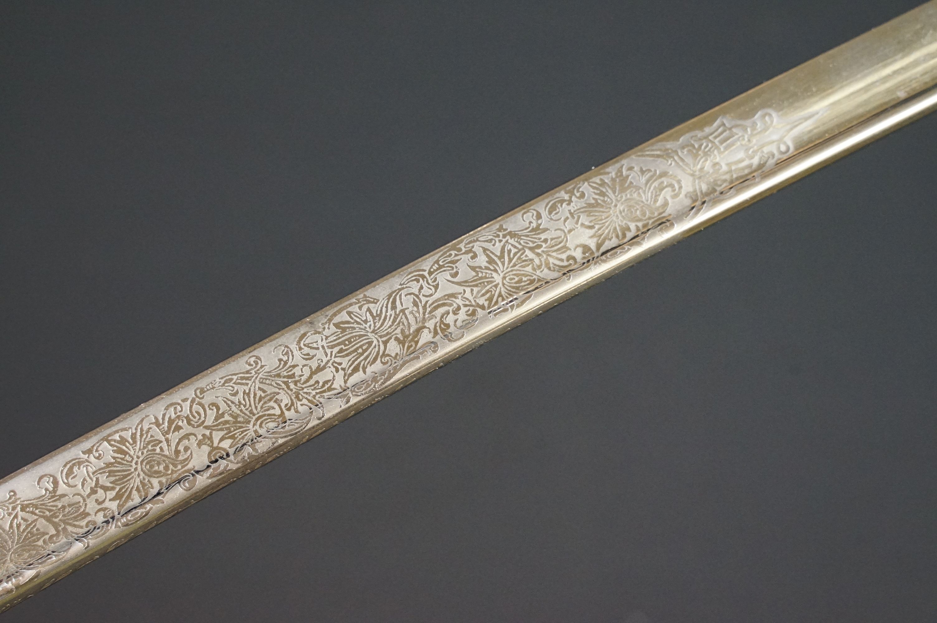 A German Imperial officers Navy dress sword complete with leather scabbard, the hilt is cast with - Image 7 of 16