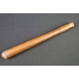 A British World war Two War Department issued wooden truncheon, marked WD together with the broad