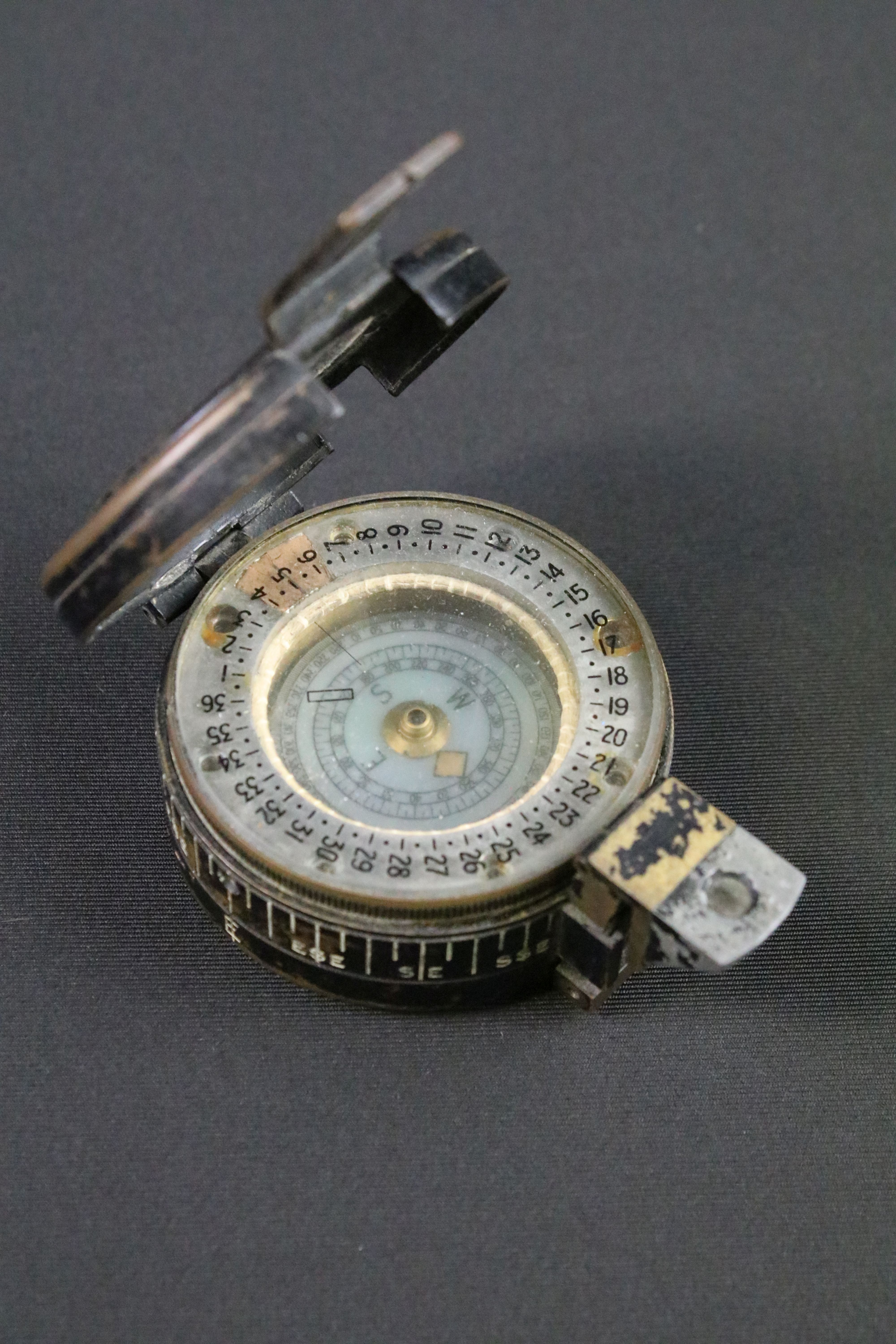 A British World War Two MK.3 marching compass, maker marked for T.G. & Co, dated 1939 and marked