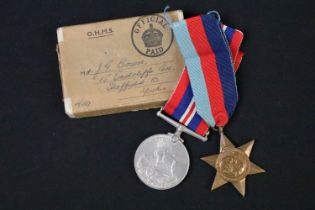 A British World War Two full size medal pair to include the 1939-45 British war medal and the 1939-