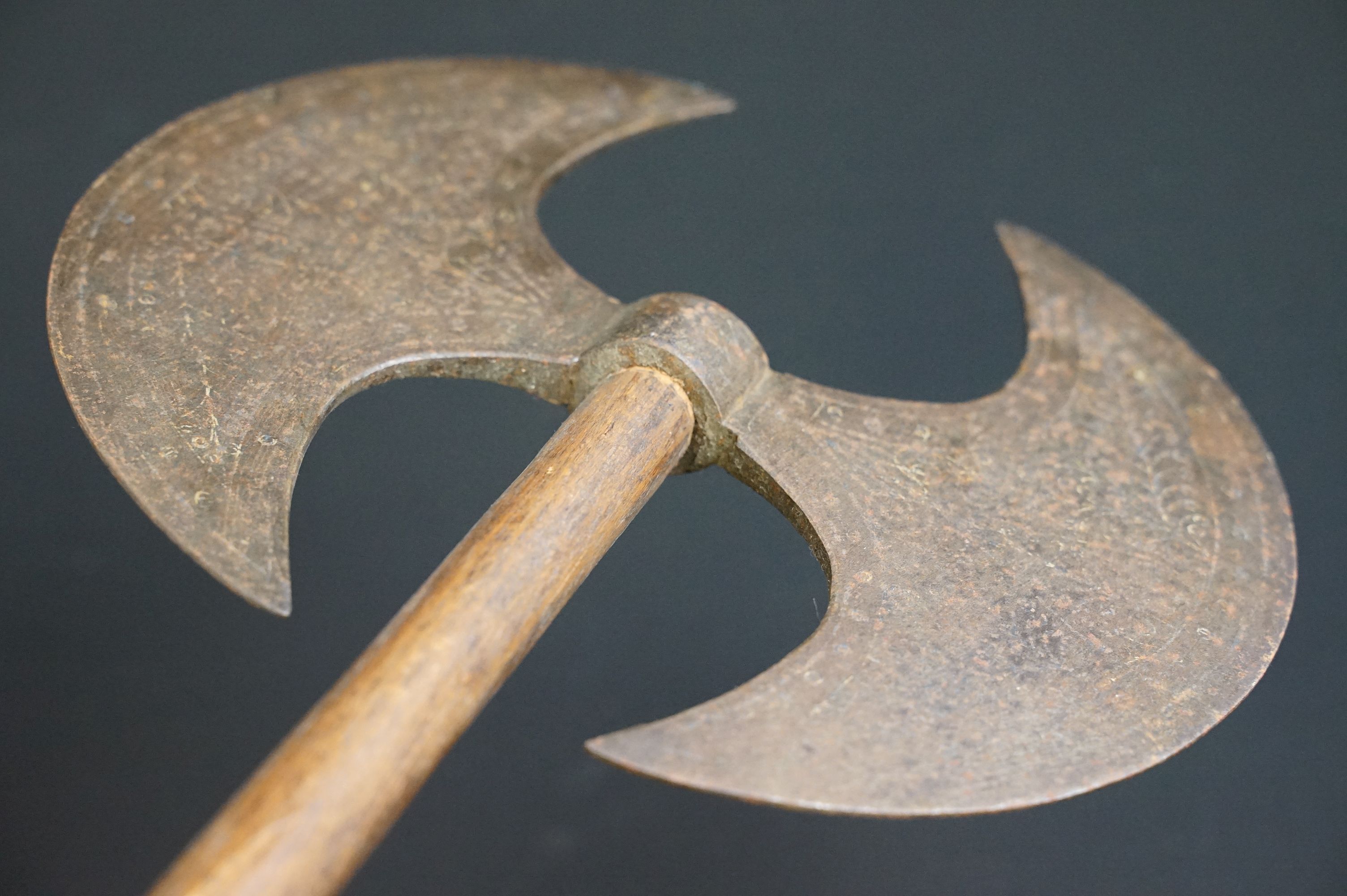 A Persian double headed axe with decorative pattern to the axe head, spike to lower wooden handle. - Image 5 of 6