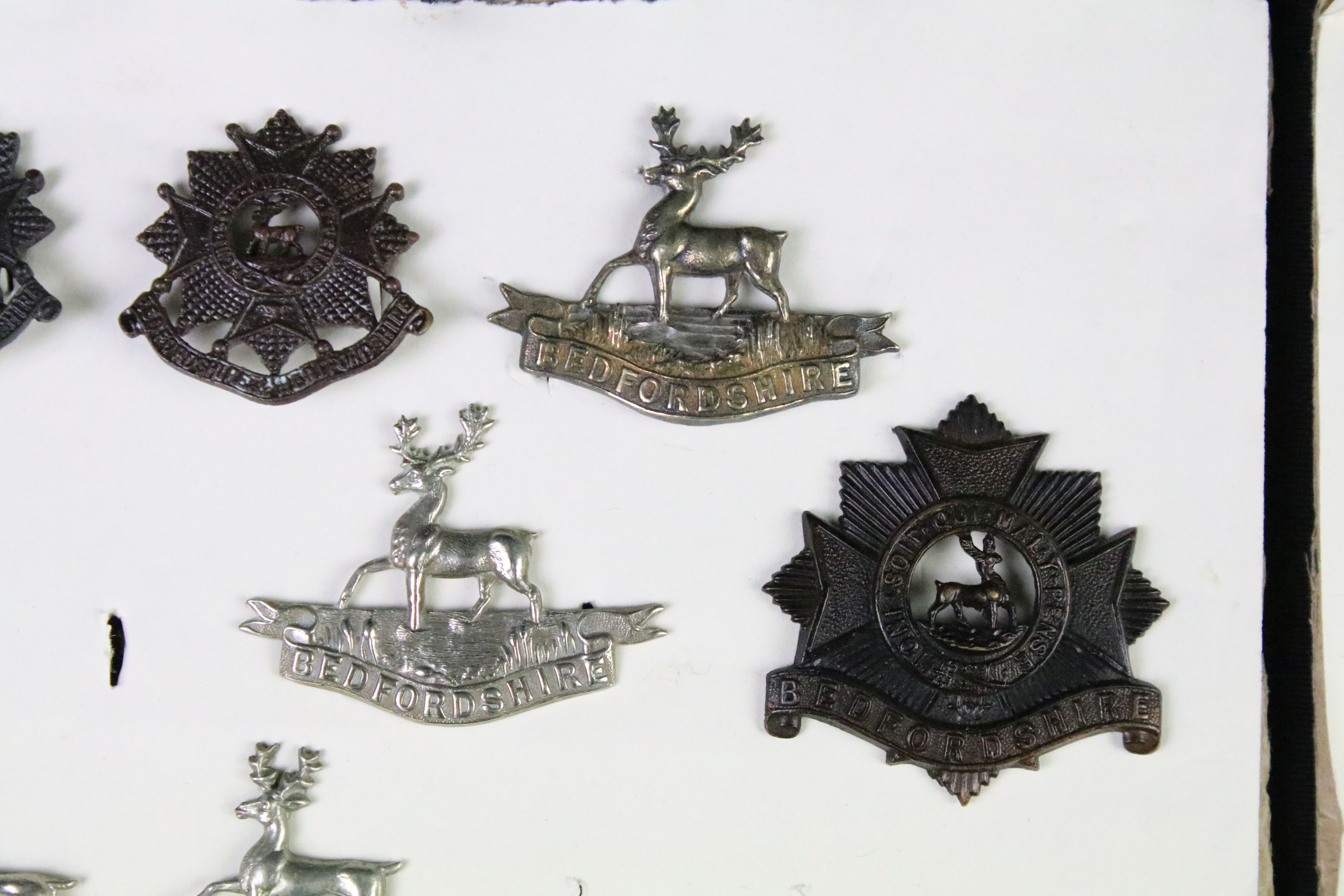 A collection of mainly British military cap and collar badges to include officers examples. - Image 3 of 18