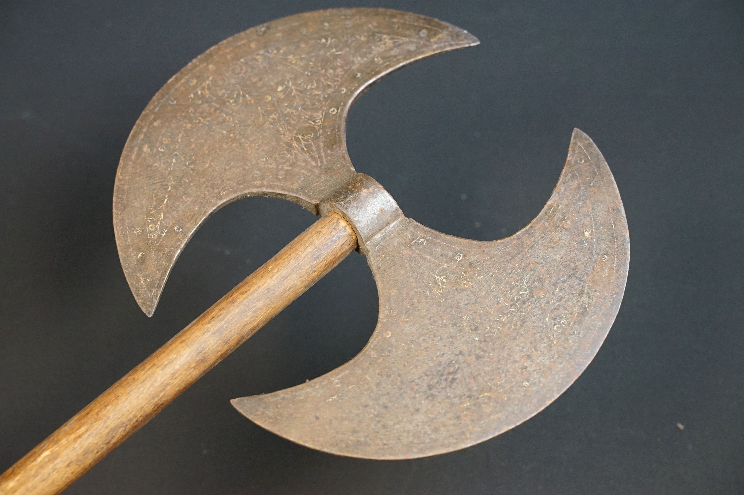 A Persian double headed axe with decorative pattern to the axe head, spike to lower wooden handle. - Image 3 of 6