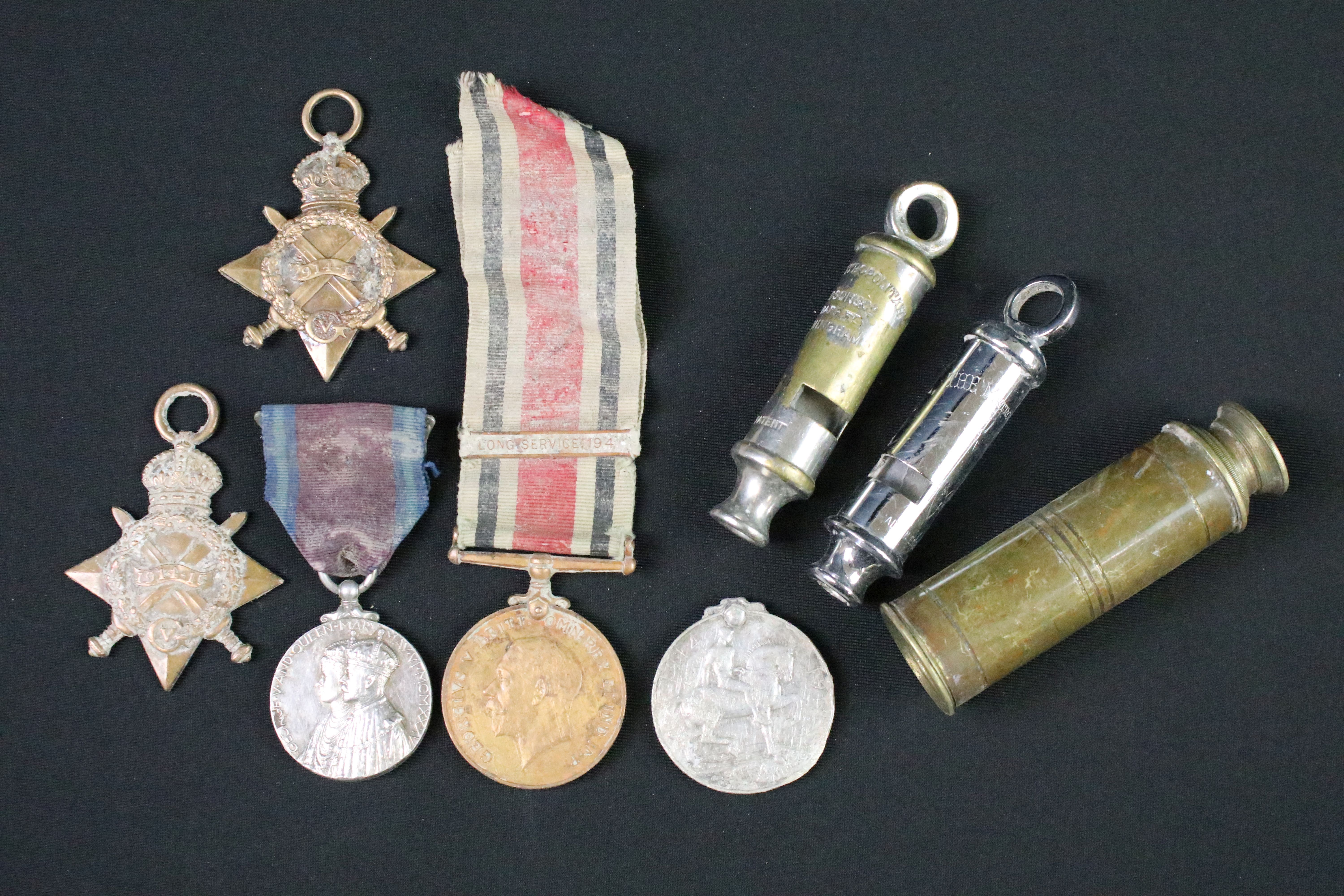 A small group of mixed militaria to include British full size World War One medals, Special