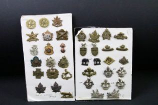 A collection of Canadian military collar badges to include World War Two King Crown issues, brass,