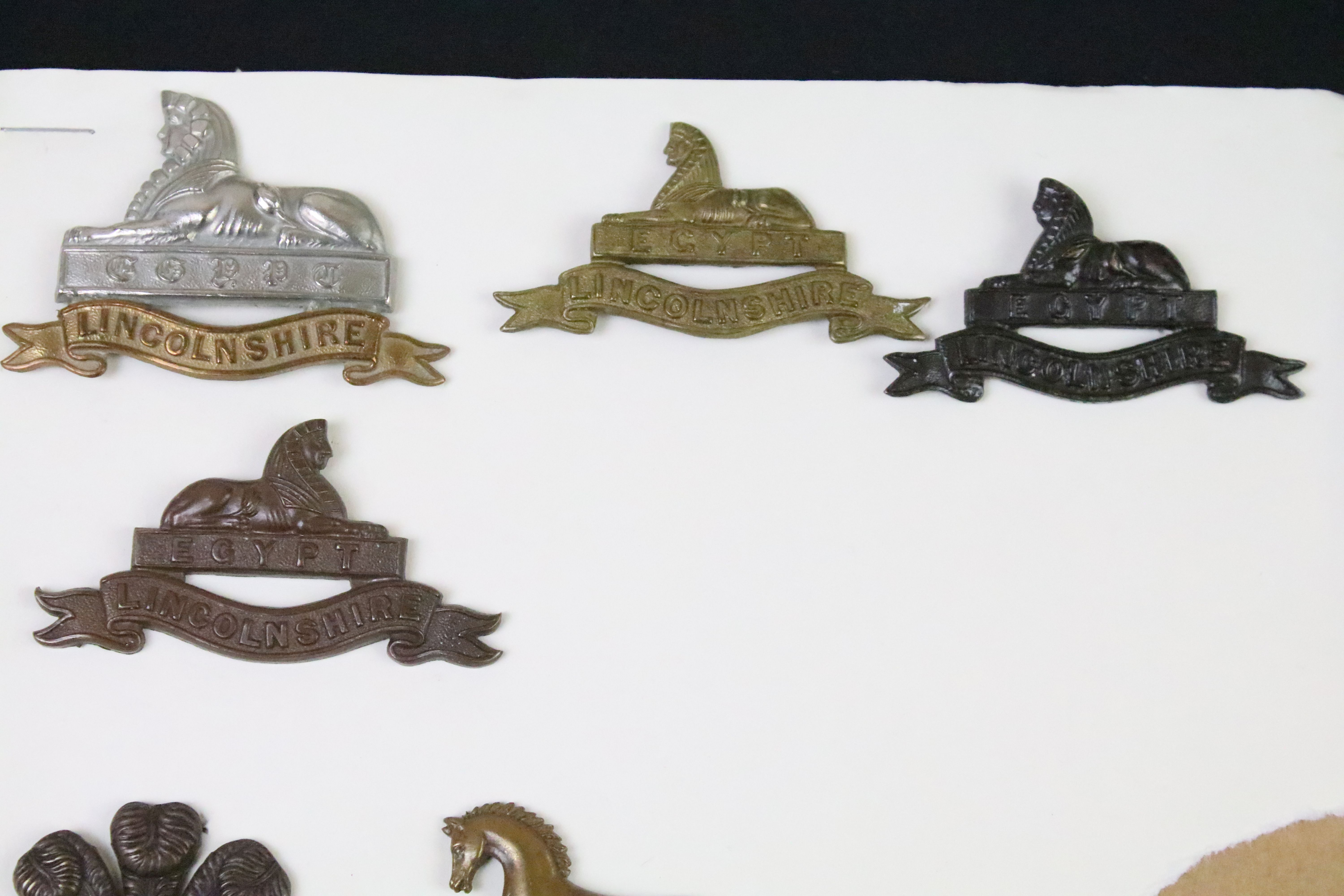 A collection of British military regimental cap and collar badges to include the Lincolnshire - Image 3 of 15