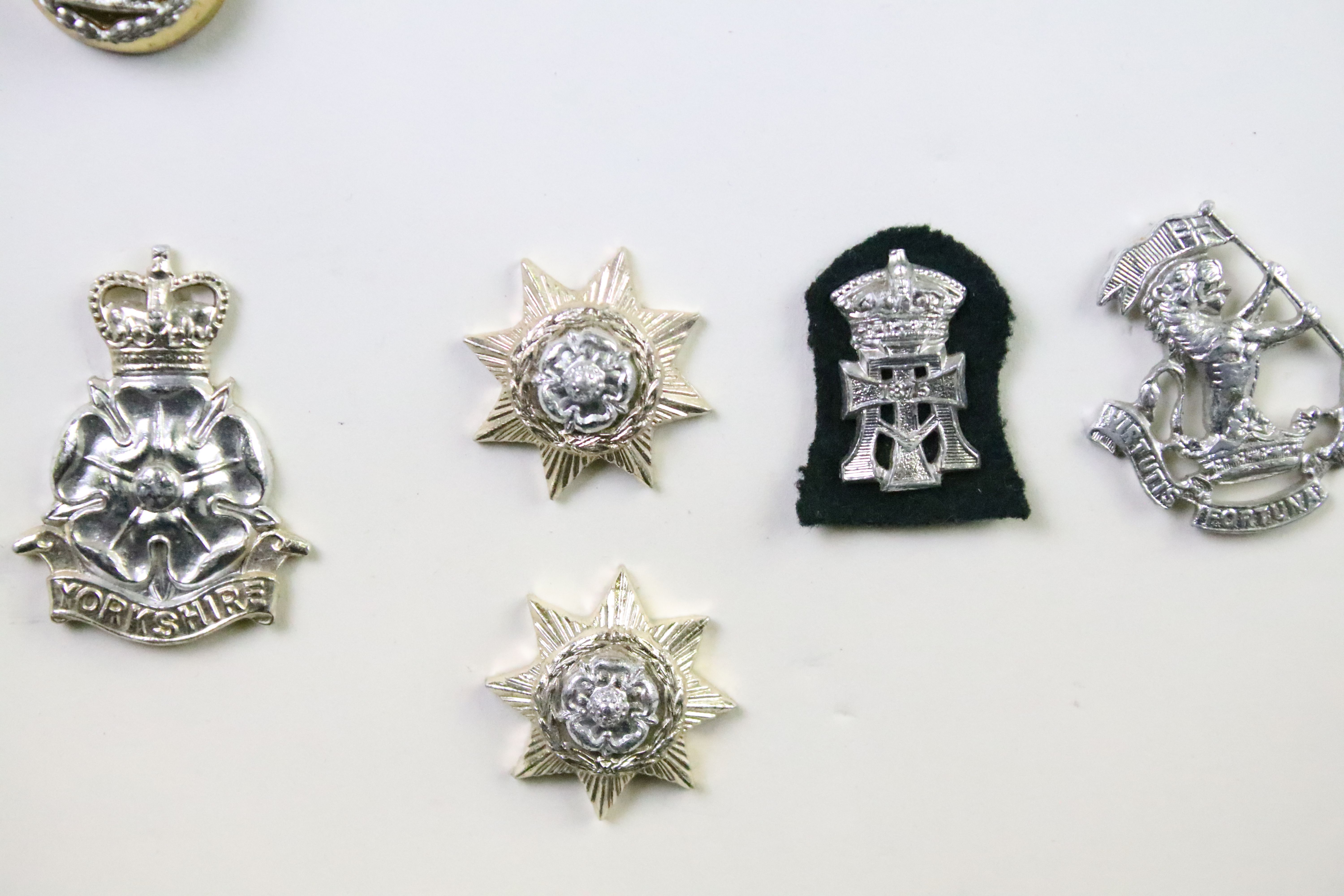 A collection of British military Regimental cap and collar badges to include the Yorkshire Regiment, - Image 8 of 13