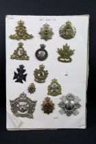 A collection of Canadian Military Queens crown cap badges to include The Canadian Officers