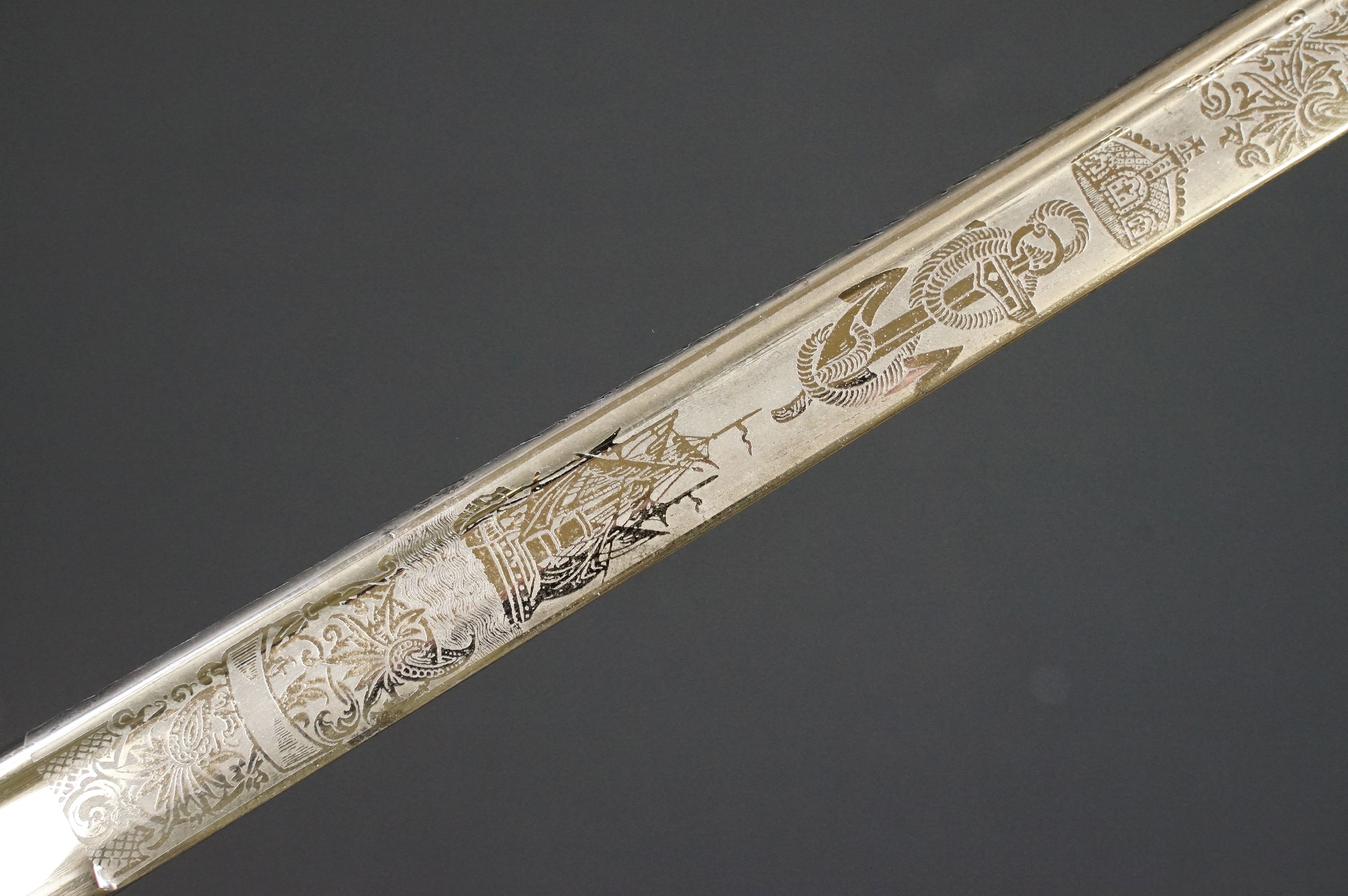 A German Imperial officers Navy dress sword complete with leather scabbard, the hilt is cast with - Image 12 of 16