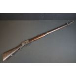 An antique Martini Henry rifle, complete condition.