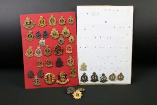 A collection of Commonwealth Royal Army Medical Corps cap and collar badges to include Canadian,