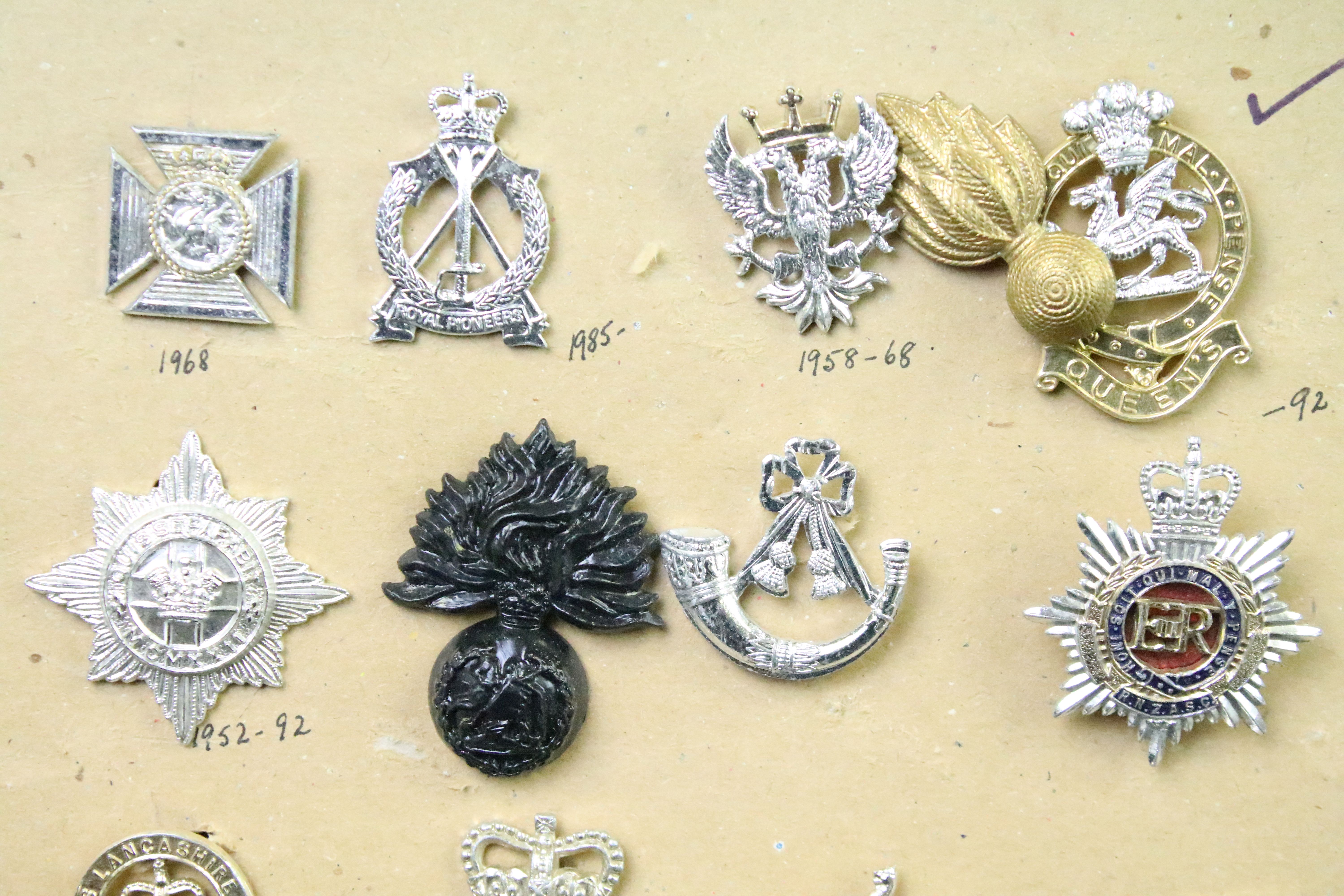 A collection of British military Regimental cap and collar badges to include the Yorkshire Regiment, - Image 11 of 13