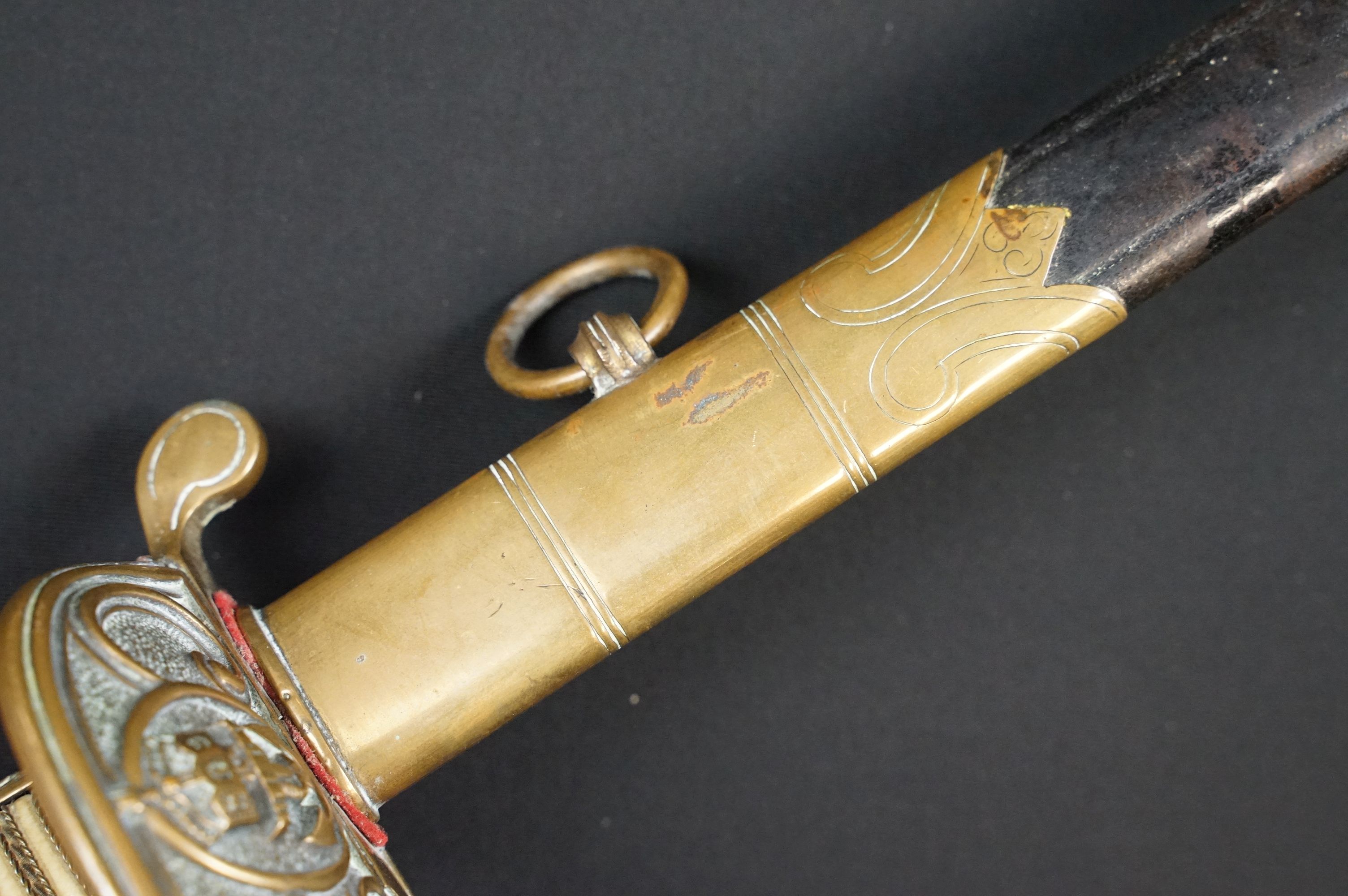 A German Imperial officers Navy dress sword complete with leather scabbard, the hilt is cast with - Image 14 of 16