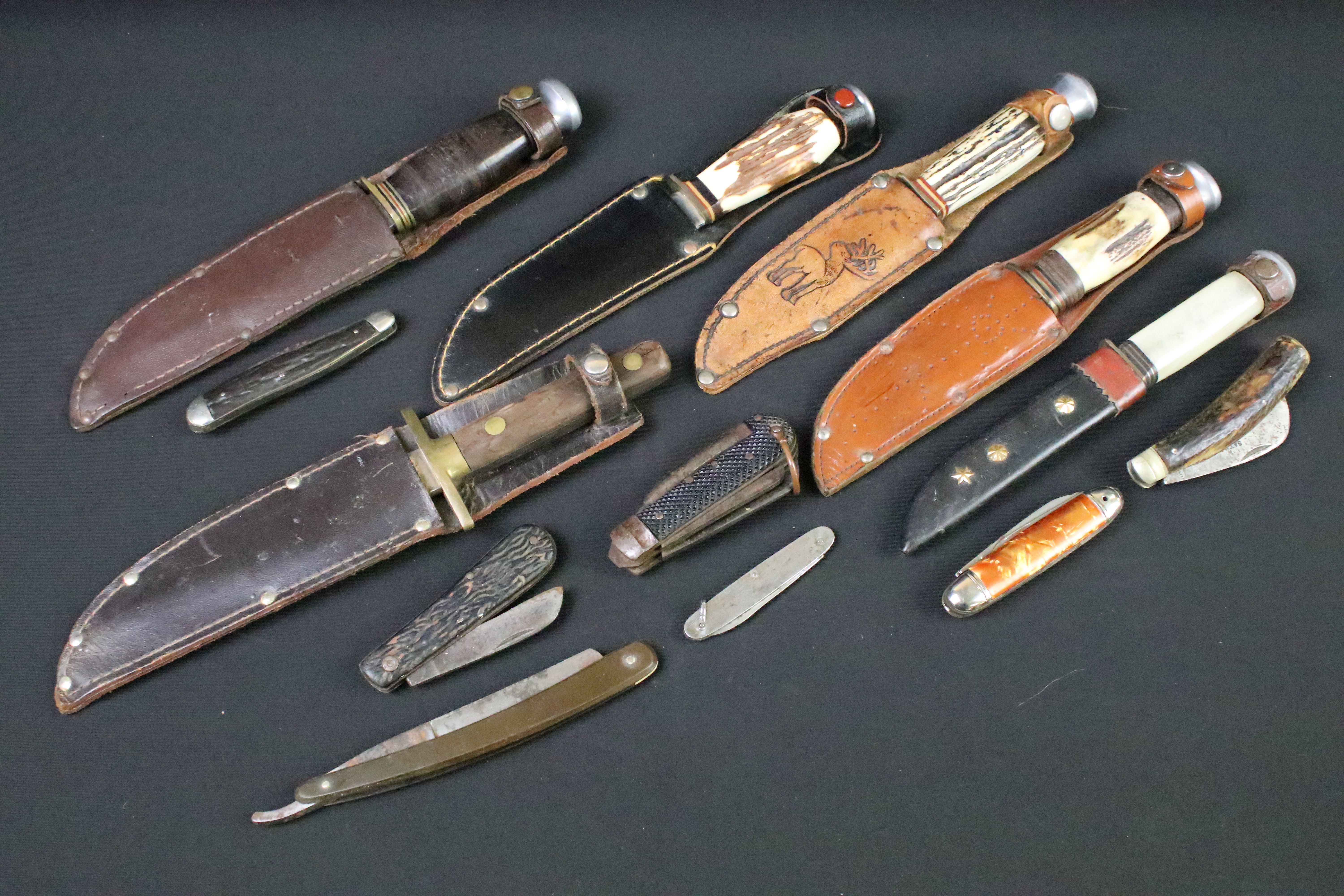 A collection of six vintage sheath knives to include a Milbro examples together with a small group