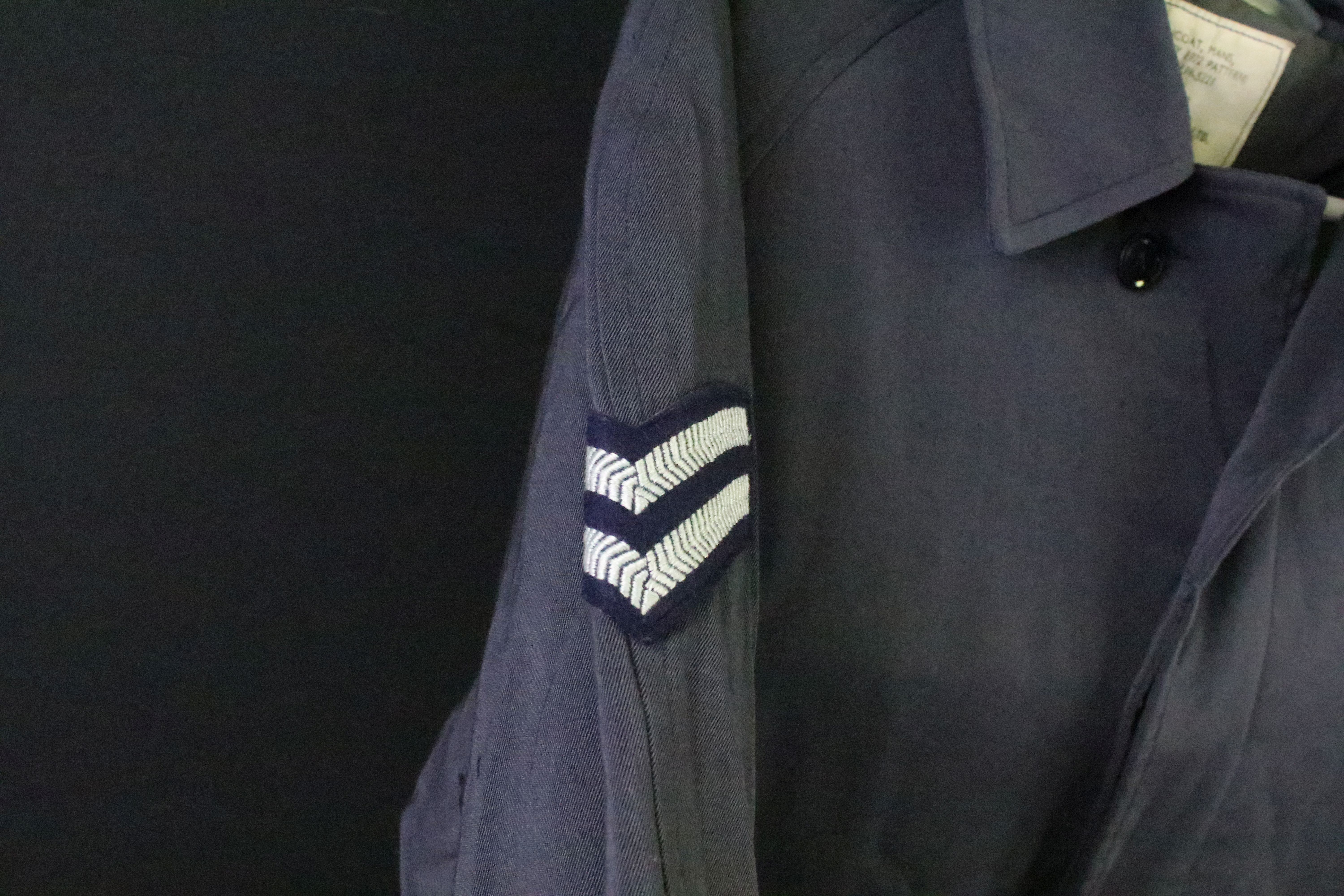 A selection of British Royal Air Force / RAF uniform to include two jackets and an overcoat. - Image 8 of 11