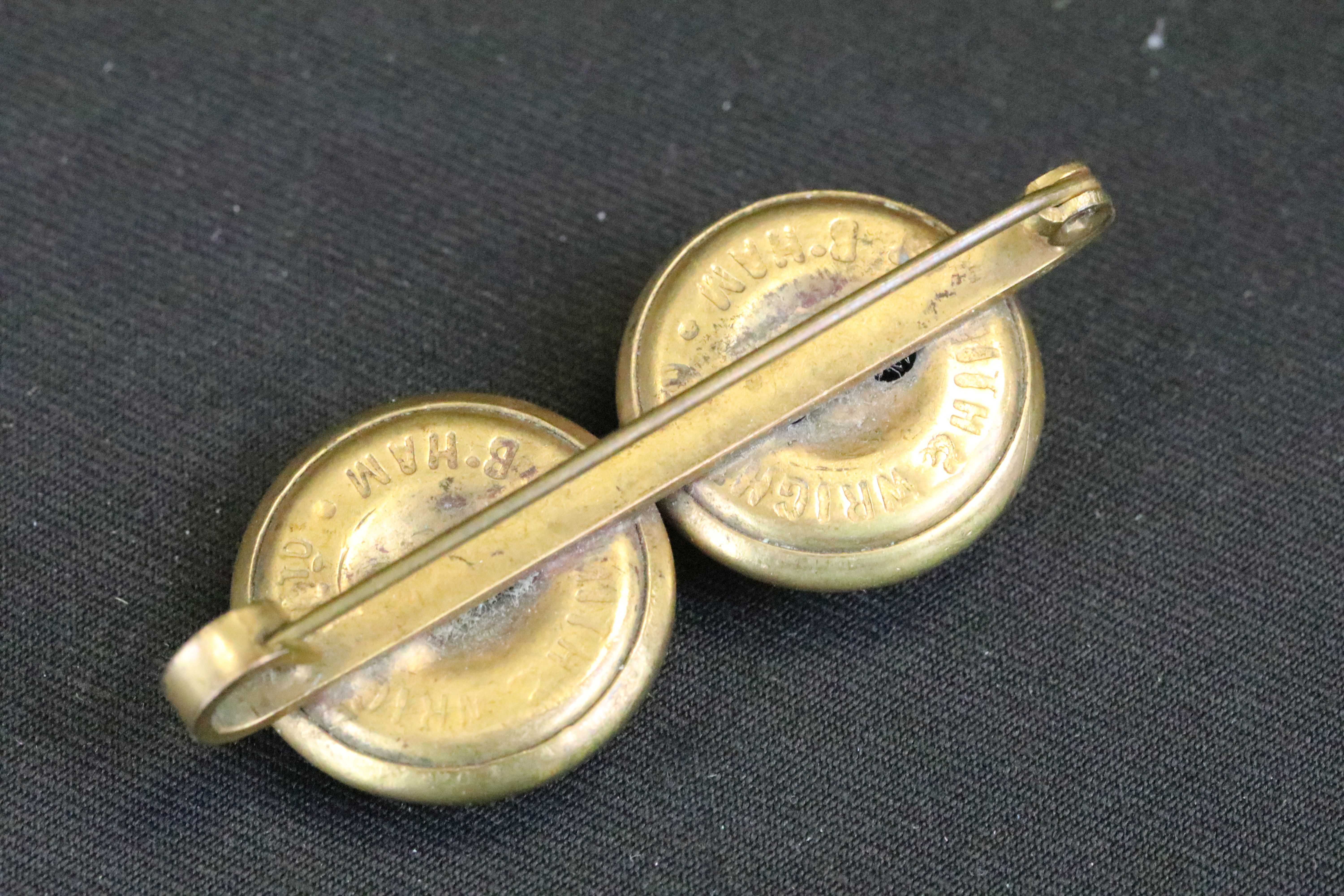 A small group of British World War Two era badges to include silver examples. - Image 5 of 9