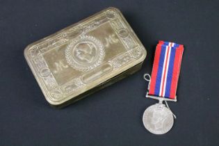 A British World War One Christmas 1914 princess Mary brass gift tin together with a full size