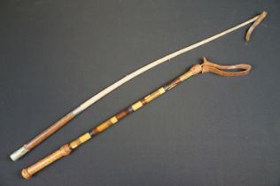 A pair of early 20th century riding crops to include one being badged to the Somerset Regiment.