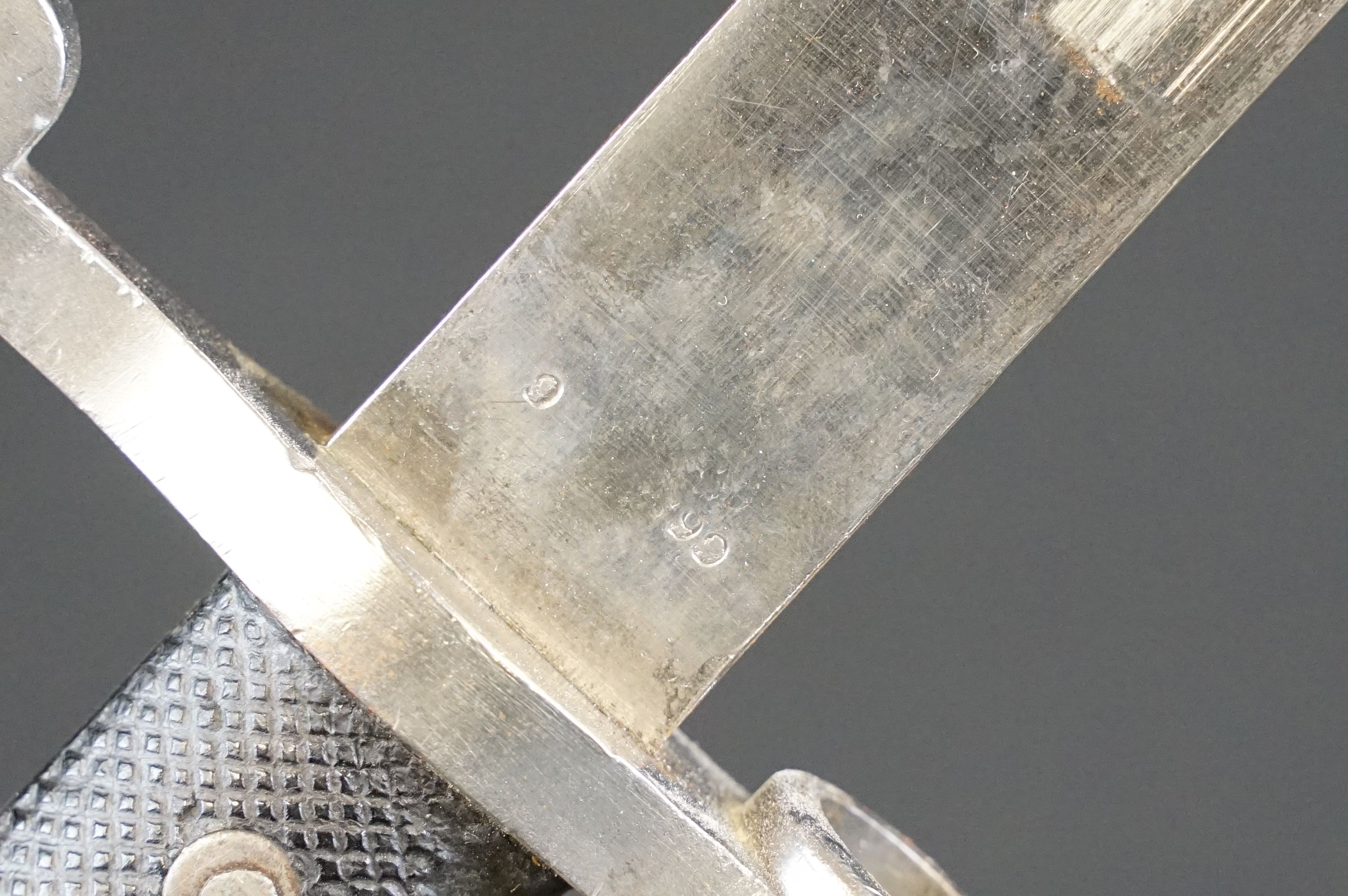 A British bayonet with good clear markings to the blade complete with scabbard and white leather - Image 3 of 16