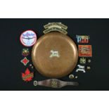 A vintage hammered copper dish badged to the Kenya Regiment together with a quantity of military