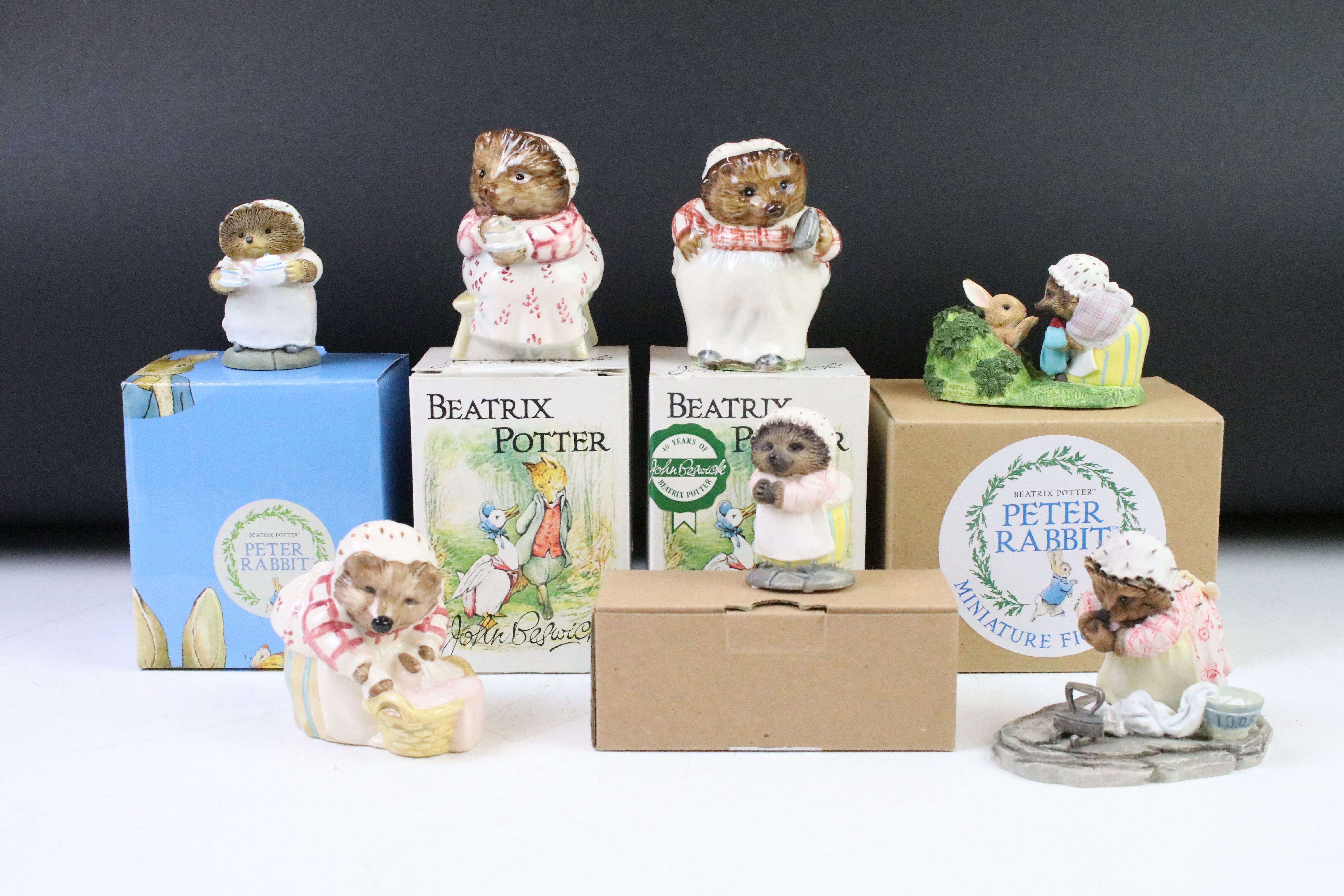 Group of seven boxed & unboxed Beatrix Potter figurines to include 3 x Beswick (Mrs Tiggy Winkle,