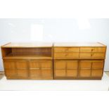 Nathan Furniture teak side units, one comprising an arrangement of four drawers above two panelled