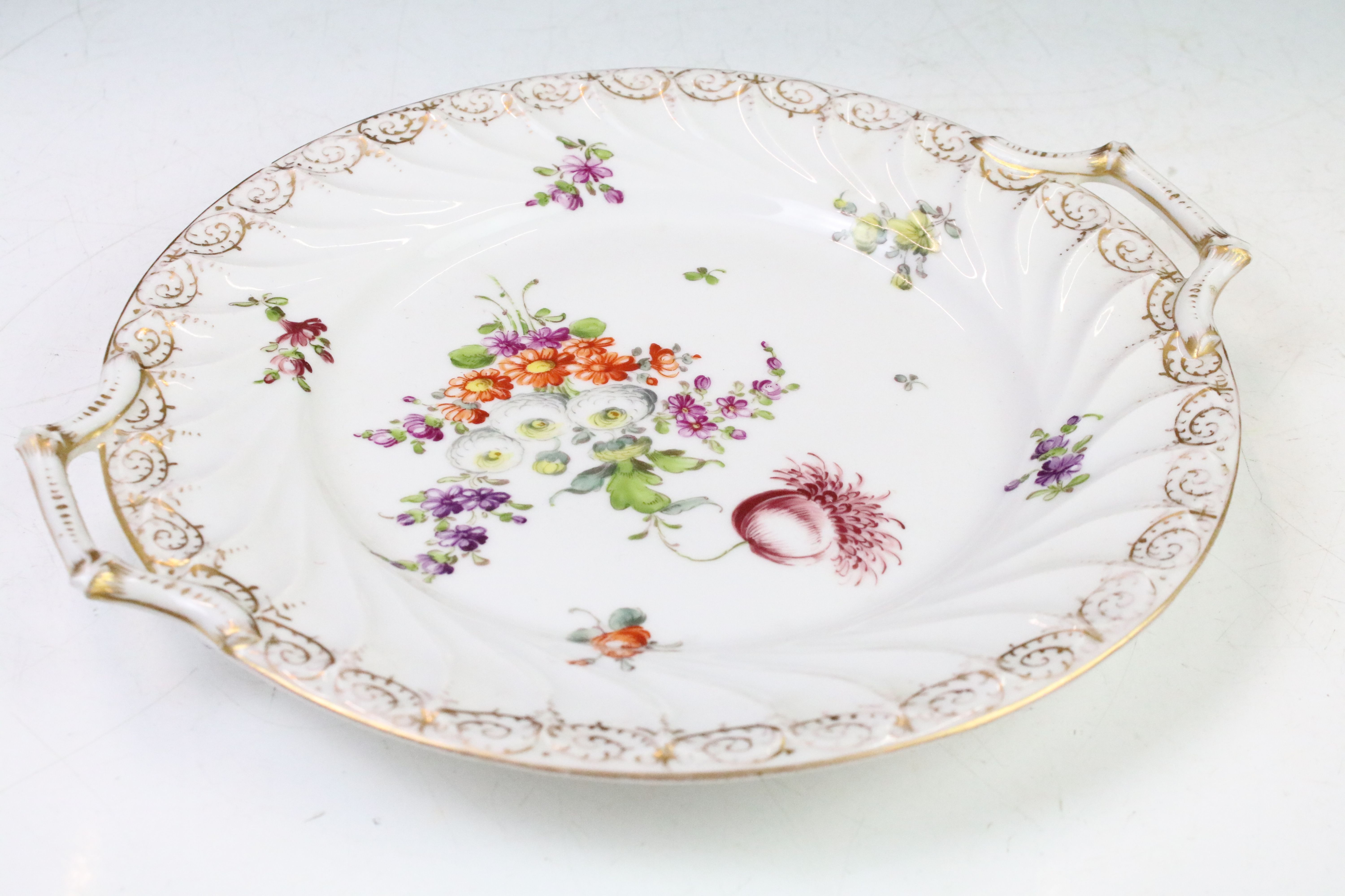 Two Dresden porcelain twin handled plates with hand painted floral decoration and gilt detail to - Image 3 of 8