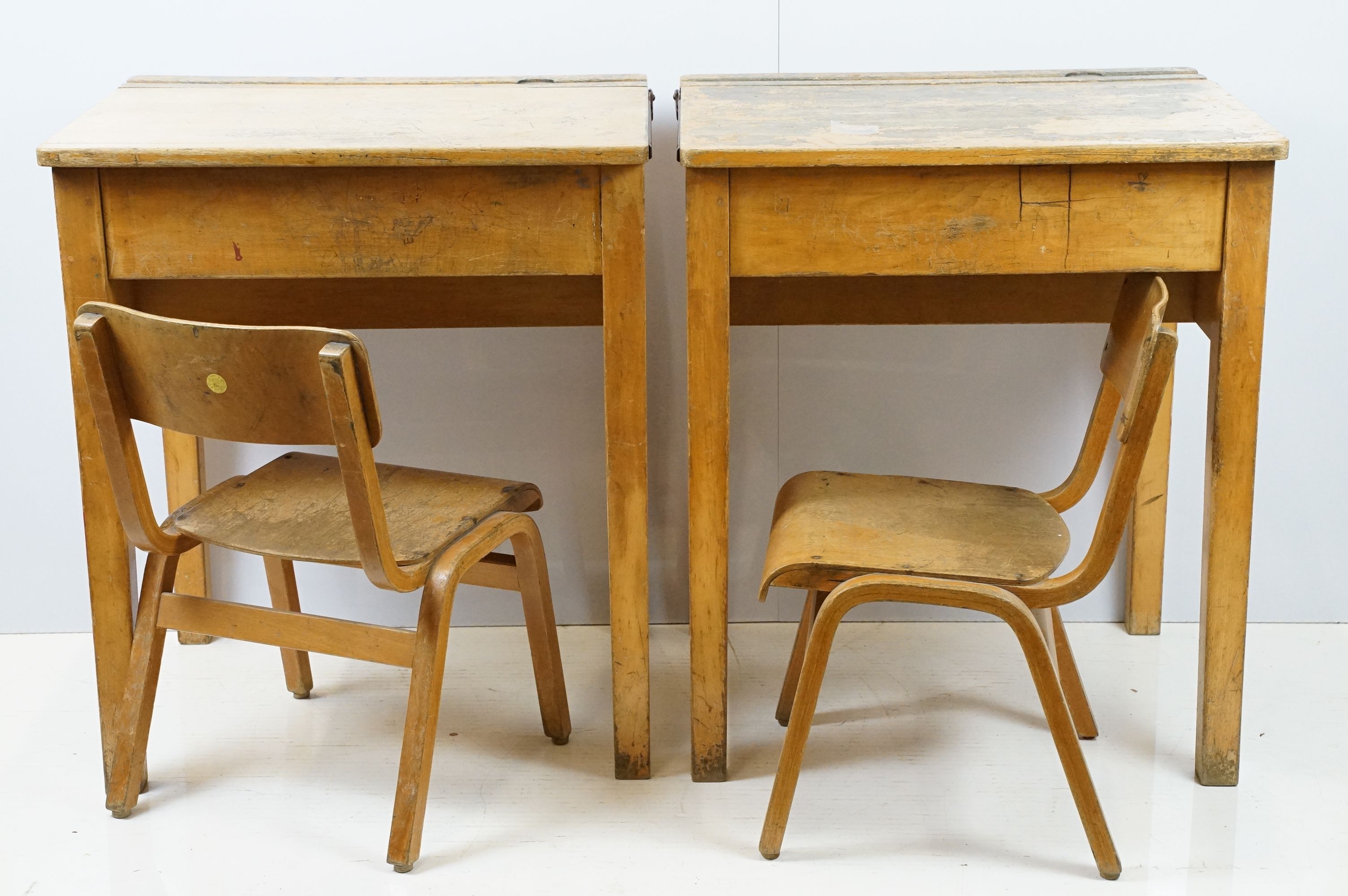 Two mid century school desks and chairs, the desks - 71cm high x 60.5cm wide x 50.5cm deep