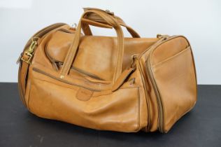 Hartmann leather carry all luggage bag with gripped handle to top and shoulder strap. Measures