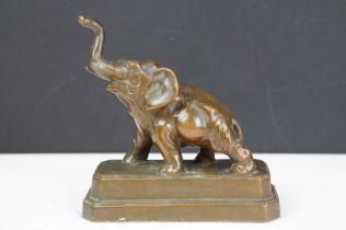 Bronze model of an Elephant on a stepped plinth base, stamped Nuari ?, N.Y.C., Made in USA, approx