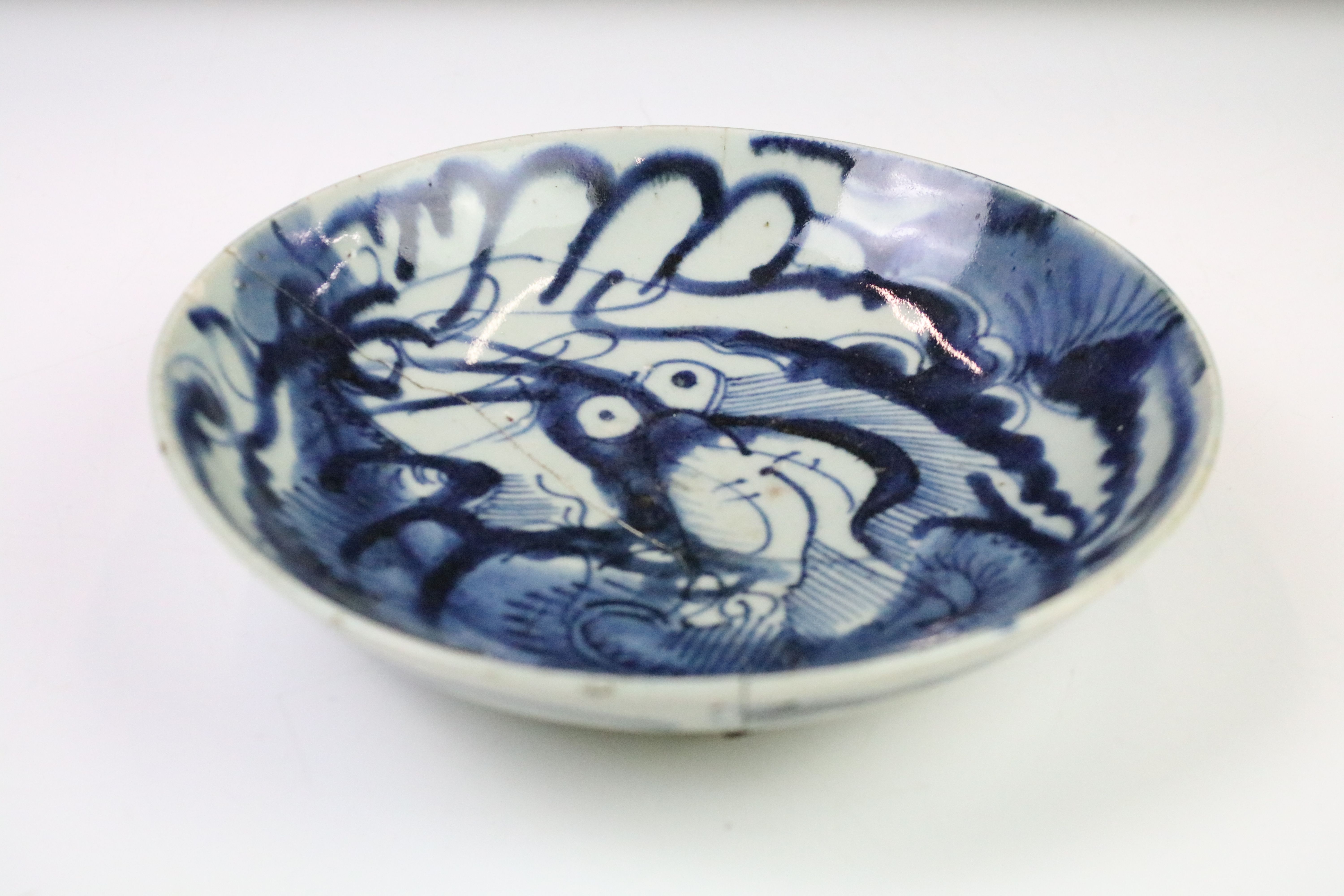 Antique Chinese Porcelain Blue and White Bowl decorated with a four claw dragon with bulging eyes in - Image 2 of 3