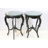 Pair of ebonized shaped circular occasional tables, of x-stretcher form, 72cm high x 49cm diameter