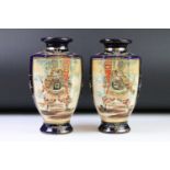 Pair of Japanese Satsuma Vases, hand painted with panels of warriors on a blue ground, red signature