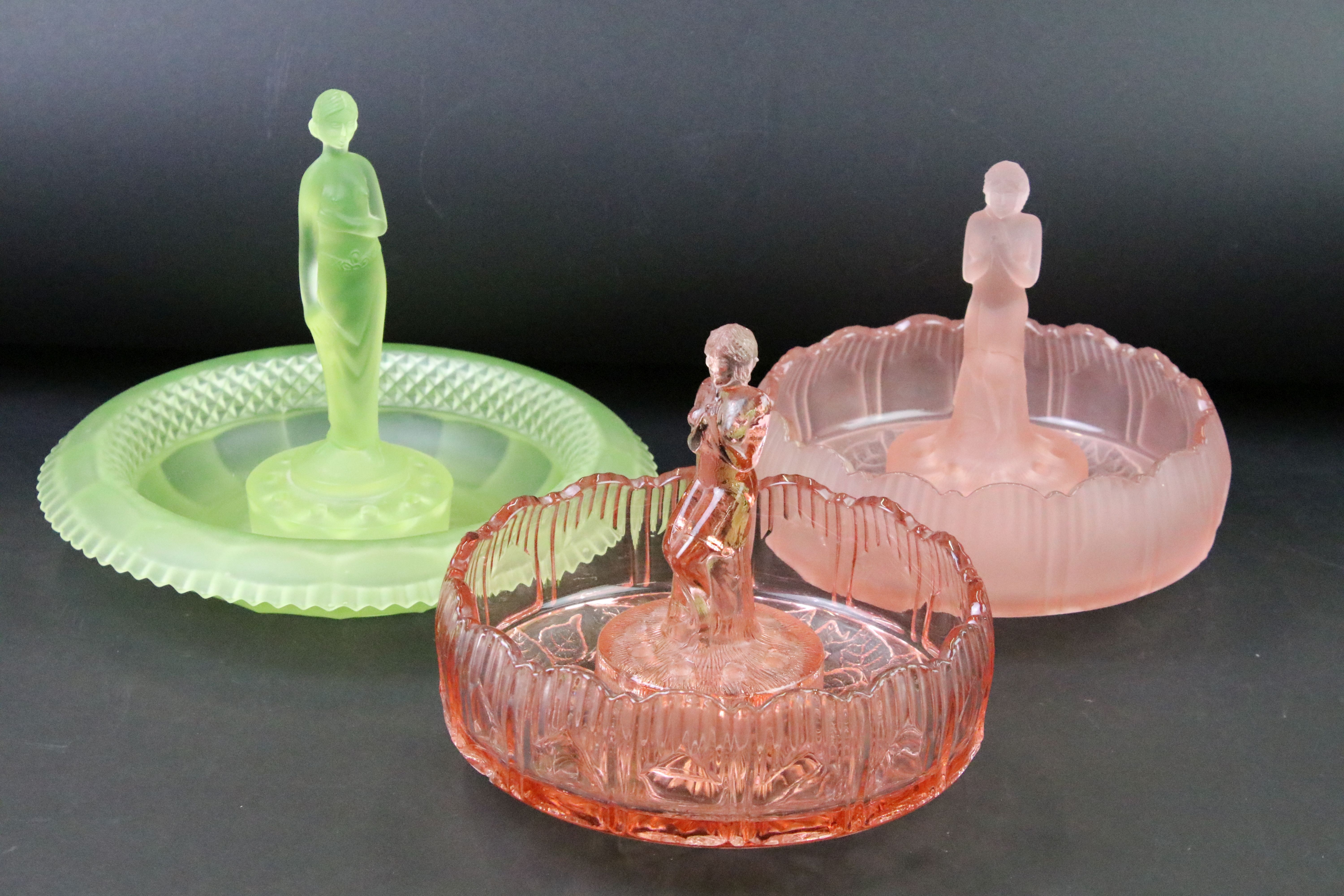 Two Sowerby rose / flower bowls with lady flower frog, one being frosted pink glass, the other clear