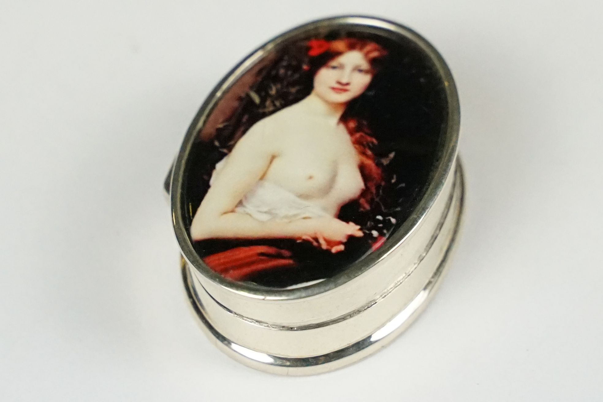 Oval shaped silver and enamel pill box