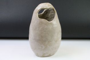 Mid Century 1960s studio art pottery vase or organic form with two openings to top and glazed in