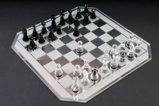 Swarovski Silver Crystal chess set complete with board and 16 pieces, housed within case and outer